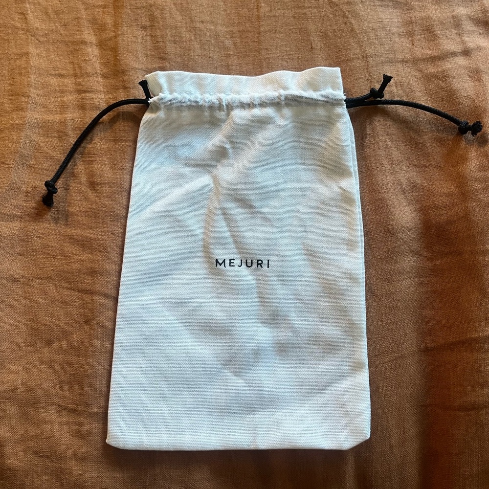 Mejuri Cream Jewelry Pouch with Black Drawstrings